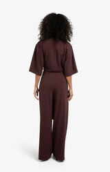 https://content.storeinfo.nl/applicatie/img/983/20251104193704_1637377_jerseyjumpsuitwithshortsleevesandtiebelt1.webp