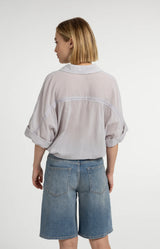 https://content.storeinfo.nl/applicatie/img/983/20260612142425_2818507_blousewithwidesleevesandbraideddetails1e807d6a652a547d69c6b9c8fb03c1630.webp