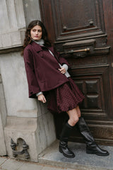 https://aimeethelabel.nl/cdn/shop/files/MenorcaW6_skirt_burgundy_LombokW6_trenchcoat_burgundy_CzechW6_sweater_grey_Aimeethelabel_2f952be2-691e-424b-bfa7-4cbd1b354895.jpg?v=1787215465&width=5000