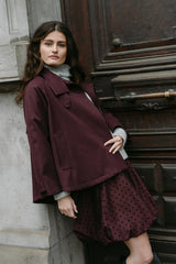 https://aimeethelabel.nl/cdn/shop/files/MenorcaW6_skirt_burgundy_LombokW6_trenchcoat_burgundy_CzechW6_sweater_grey_Aimeethelabel_4cc75da9-b695-4548-8016-b767af2fceb3.jpg?v=1787215459&width=5000
