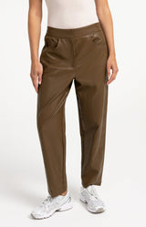 https://yaya.eu/cdn/shop/files/faux-leather-carrot-fit-trousers-1_5033230d-ea3d-4a55-a929-03ce234558de.jpg?v=1785826192&width=1200
