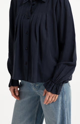 https://yaya.eu/cdn/shop/files/sheer-blouse-with-pleated-details_ae04762f-c27d-456b-af28-bfca4072b376.jpg?v=1787683106&width=1200