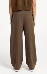 https://yaya.eu/cdn/shop/files/woven-barrel-leg-trousers-with-pleat-detail_beced438-dc70-4b11-ad88-245b58e58ac9.jpg?v=1786546950&width=1200